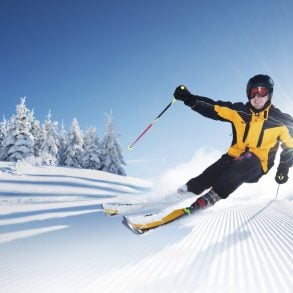 person skiing down a hill