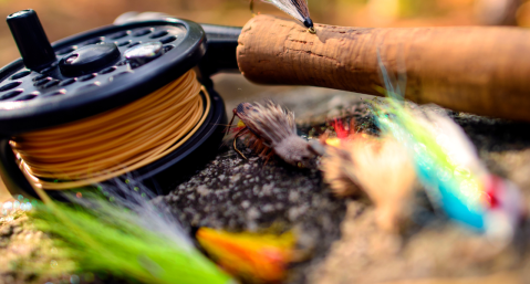 fly fishing rod, reel, and flies