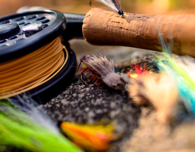 fly fishing rod, reel, and flies