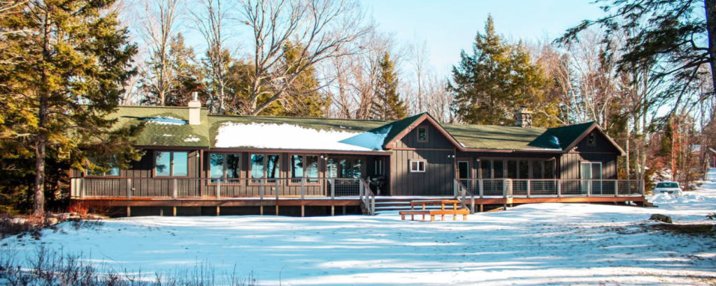 exterior of vacation rental in michigan with snow
