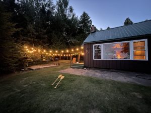An image of Stonington Clearview Cottage at night.