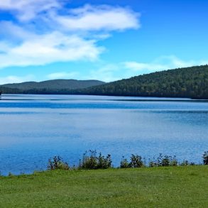 A summer camp setting on an alpine lake in Northern Michigan.